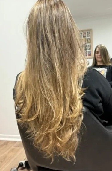 After: blended blonde with soft layers